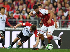 Sydney Western Wanderers V Arsenal 2017-18 Prints: Clash in Sydney: Olivier Giroud vs. Jacob Melling