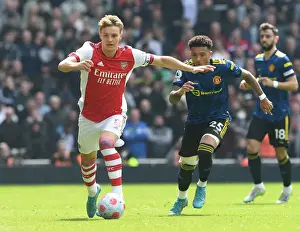 Clash of Talents: Arsenal's Odegaard vs Man Utd's Sancho in Premier League Showdown