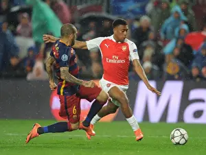 Barcelona V Arsenal 2015-16 Prints: Clash of Talents: Iwobi vs Alves - Arsenal's Rising Star vs Barcelona's Veteran