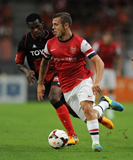 Nagoya Grampus V Arsenal 2013-14 Prints: Clash of Talents: Jack Wilshere vs Danilson, Arsenal vs Nagoya Grampus (2013)