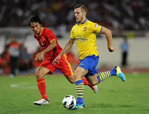 Vietnam V Arsenal 2013-14 Prints: Clash of Talents: Jack Wilshere vs Pham Nguyen Sa - Arsenal vs Vietnam, 2013