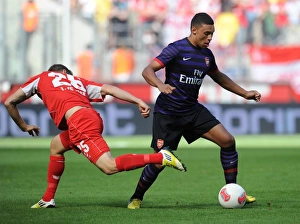 Cologne V Arsenal 2012-13 Prints: Clash of Talents: Oxlade-Chamberlain vs. Royer in Cologne Pre-Season Friendly