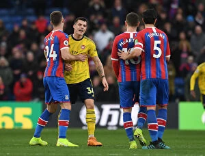 Images Dated 11th January 2020: Clash of Temperaments: Xhaka and McArthur Lock Horns in Crystal Palace vs Arsenal Premier League