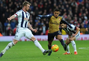 West Bromwich Albion V Arsenal 2015-16 Prints: Clash of Titans: Alexis Sanchez vs. Chris Brunt in Premier League Showdown