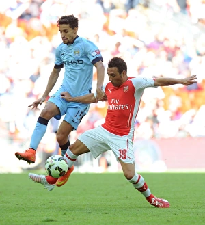 Arsenal V Manchester City - FA Community Shield 2014/15 Prints: Clash of Titans: Cazorla vs. Navas in the FA Community Shield Showdown