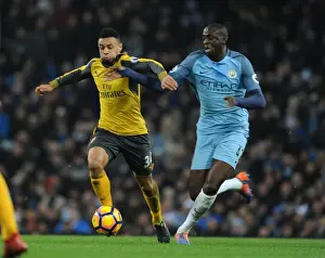 Manchester City V Arsenal 2016-17 Prints: Clash of Titans: Coquelin vs. Yaya Toure - Manchester City vs
