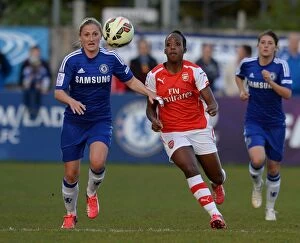 Images Dated 30th April 2015: Clash of Titans: Danielle Carter vs. Laura Coombs - A WSL Showdown between Chelsea