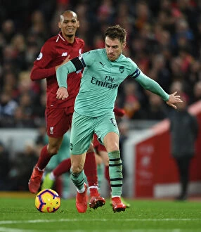 Images Dated 29th December 2018: Clash of Titans: Fabinho vs. Ramsey - Liverpool vs. Arsenal, Premier League, 2018-19