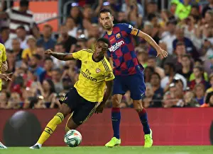 Clash of Titans: FC Barcelona vs. Arsenal - Joe Willock vs. Sergio Busquets