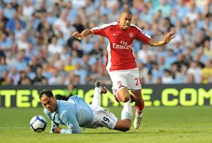 Manchester City V Arsenal 2009-10 Prints: Clash of Titans: Gael Clichy vs Joleon Lescott in Manchester City's 4:2 Victory over Arsenal