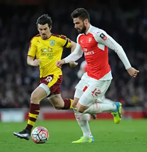 Clash of the Titans: Giroud vs. Barton in Arsenal's FA Cup Battle against Burnley
