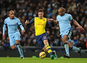 Manchester City V Arsenal 2014-15 Prints: Clash of Titans: Giroud vs. Kompany & Fernando - Manchester City vs