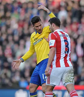 Stoke City V Arsenal 2013-14 Prints: Clash of Titans: Giroud vs Pieters in Stoke City vs Arsenal Premier League Match