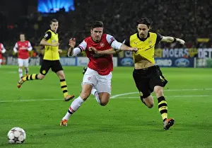 Borussia Dortmund V Arsenal 2013-14 Prints: Clash of Titans: Giroud vs. Subotic - Borussia Dortmund vs