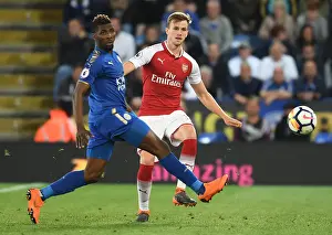 Leicester City V Arsenal 2017-18 Prints: Clash of Titans: Holding vs Iheanacho - A Battle for Premier League Dominance