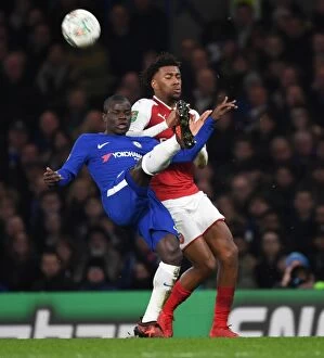 Chelsea v Arsenal - Carabao Cup 1/2 final 1st leg 2017-18 Collection: Clash of Titans: Iwobi vs. Kante in Carabao Cup Semi-Final Showdown