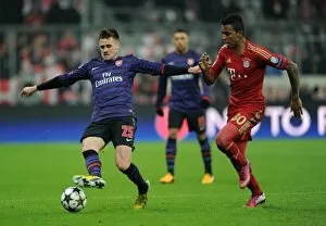 Bayern Munich Collection: Clash of Titans: Jenkinson vs. Gustavo - Bayern Munich vs. Arsenal, UEFA Champions League 2013