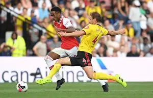 Clash of the Titans: Joe Willock vs Craig Dawson - A Premier League Battle at Vicarage Road