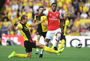 Clash of the Titans: Joe Willock vs Craig Dawson - Premier League Showdown between Arsenal and Watford