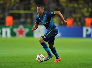 Borussia Dortmund V Arsenal 2014-15 Prints: Clash of Titans: Kieran Gibbs vs. Borussia Dortmund in the 2014-15 UEFA Champions League