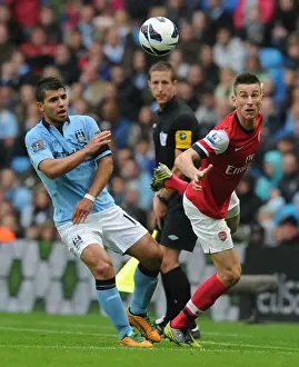Manchester City V Arsenal 2012:13 Prints: Clash of Titans: Koscielny vs. Aguero - Manchester City vs. Arsenal, Premier League, 2012