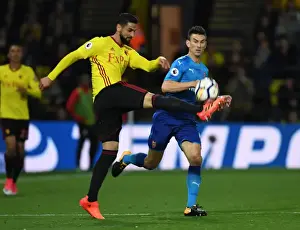 Watford V Arsenal 2017-18 Prints: Clash of Titans: Koscielny vs. Britos in Watford v Arsenal Premier League Showdown