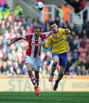 Stoke City V Arsenal 2013-14 Prints: Clash of Titans: Koscielny vs. Crouch - A Premier League Battle (Stoke City vs)