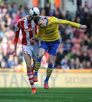 Stoke City V Arsenal 2013-14 Prints: Clash of Titans: Koscielny vs. Crouch - Stoke City vs. Arsenal, Premier League