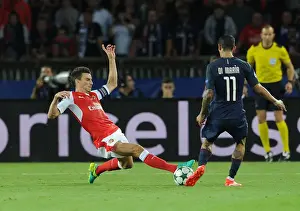 Paris Saint Gernain V Arsenal 2016-17 Prints: Clash of Titans: Koscielny vs. Di Maria - Paris Saint-Germain vs