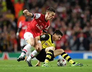 Arsenal V Borussia Dortmund 2013-14 Prints: Clash of Titans: Koscielny vs. Lewandowski - Arsenal vs