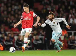 Arsenal V West Ham United 2013/14 Prints: Clash of Titans: Koscielny vs. Nocerino - Arsenal v West Ham United, Premier League