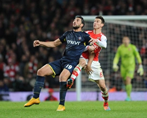 Arsenal V Southampton 2014-15 Prints: Clash of Titans: Koscielny vs. Pelle in Arsenal vs. Southampton Premier League Showdown