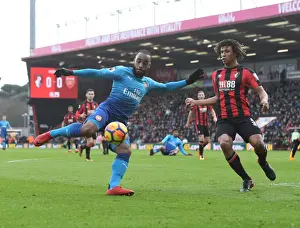 AFC Bournemouth V Arsenal 2017-18 Prints: Clash of Titans: Lacazette vs Ake in AFC Bournemouth vs Arsenal Premier League Showdown