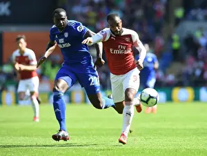 Cardiff City V Arsenal 2018-19 Prints: Clash of Titans: Lacazette vs. Bamba - Cardiff City vs. Arsenal FC, Premier League 2018-19