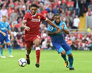 Liverpool V Arsenal 2017-18 Prints: Clash of Titans: Lacazette vs. Gomez - Premier League Showdown: Liverpool vs