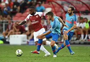 Arsenal V Atletico Madrid 2018-19 Prints: Clash of Titans: Lacazette vs Juanfran and Toni Moya - Arsenal vs Atletico Madrid