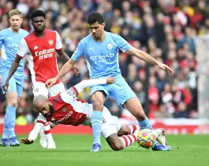 Clash of Titans: Lacazette vs Rodri - Arsenal vs Manchester City Showdown (2021-22)