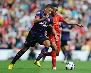 Liverpool V Arsenal 2012-13 Prints: Clash of Titans: Liverpool vs. Arsenal - Oxlade-Chamberlain vs. Sterling (2012-13)