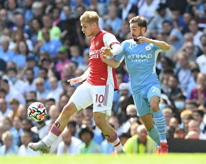 Manchester City v Arsenal 2021-22 Collection: Clash of Titans: Manchester City vs. Arsenal - Smith Rowe vs. Silva