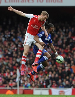 Clash of Titans: Mertesacker vs. Drogba - Arsenal vs. Chelsea Showdown
