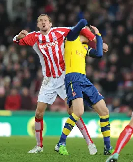 Stoke City V Arsenal 2014-15 Prints: Clash of Titans: Per Mertesacker vs