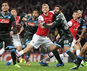 Arsenal V Napoli 2013-14 Prints: Clash of Titans: Per Mertesacker vs