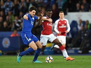Leicester City v Arsenal 2017-18 Collection: Clash of Titans: Nketiah vs Maguire - Leicester City vs Arsenal, Premier League 2017-18