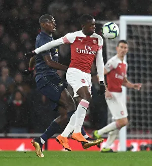 Arsenal V Manchester United 2018-19 Prints: Clash of Titans: Nketiah vs. Pogba - Arsenal vs. Manchester United, Premier League