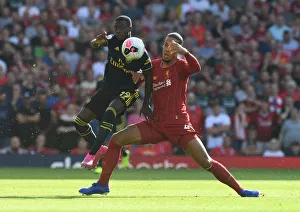 Clash of Titans: Pepe vs. Van Dijk - Premier League Showdown: Arsenal's Pepe Takes on Liverpool's Van Dijk