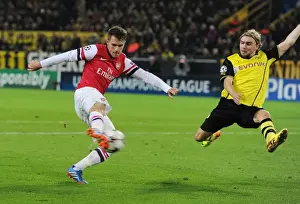 Borussia Dortmund V Arsenal 2013-14 Prints: Clash of Titans: Ramsey vs. Schmelzer - Borussia Dortmund vs