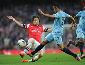 Images Dated 29th March 2014: Clash of Titans: Rosicky vs. Clichy - Arsenal vs. Manchester City, Premier League, 2014