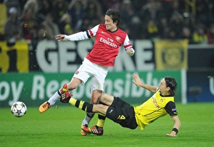 Clash of Titans: Rosicky vs. Subotic - Arsenal vs. Borussia Dortmund, UEFA Champions League, 2013: A Battle of Strength and Skill