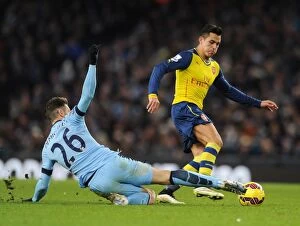 Images Dated 18th January 2015: Clash of Titans: Sanchez vs. Demichelis - A Football Rivalry in the Premier League 2014-15