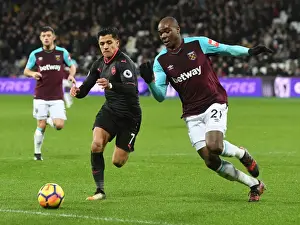 West Ham United V Arsenal 2017-18 Prints: Clash of Titans: Sanchez vs. Ogbonna - A Football Showdown at London Stadium